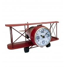 Aeroplano di latta rosso con orologio 